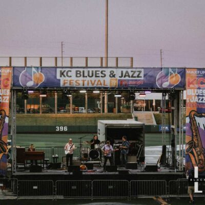 Kansas City Blues and Jazz Festival 2025, broad view of stage in a baseball field. Photo credit Black Moon Media LIVE